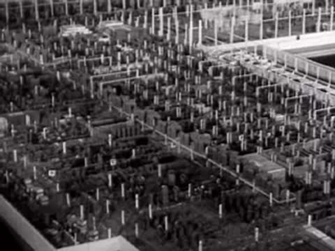 An aerial view of an industrial manufacturing plant model.