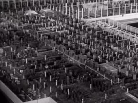 An aerial view of an industrial factory setup model.