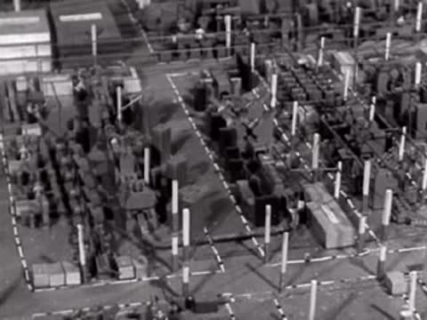 An overhead view of an industrial manufacturing floor model.
