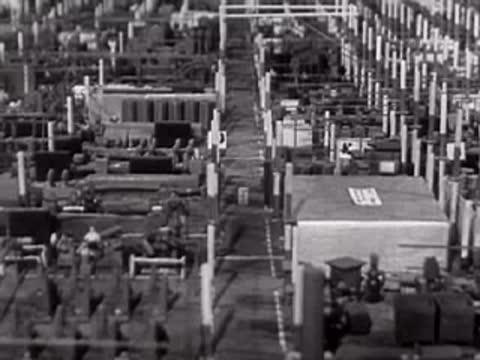 An aerial view of a factory model layout with equipment.