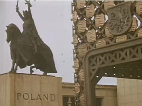 A medium shot of a statue of a knight on horseback with the word POLAND below.