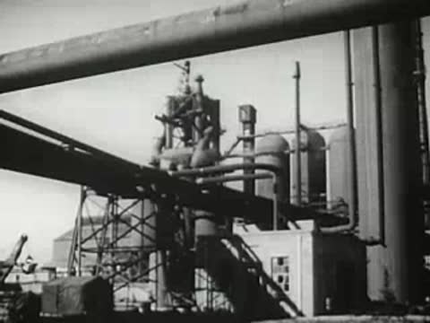 Heavy industrial facility with pipes and metal structures