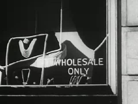 Jewelry store window display with Wholesale Only sign