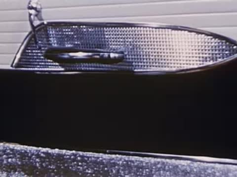Close-up of convertible car door handle and trim