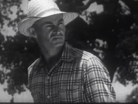 Elderly man looking sideways, followed by a smiling man wearing a straw hat.