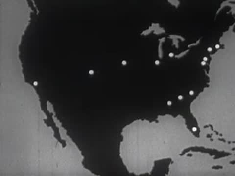 Animated map of North America showing dots appearing representing cities or settlements.