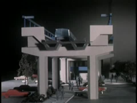 Model display of a multi-level transit station with cars