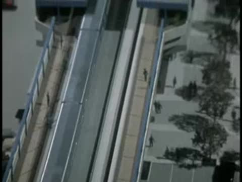 Model display showing aerial view of transit tracks and platform
