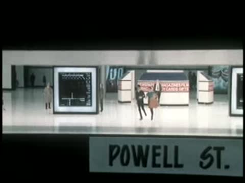 Model display of a Powell Street transit station concourse