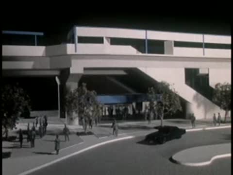 Architectural model of street intersection with pedestrians