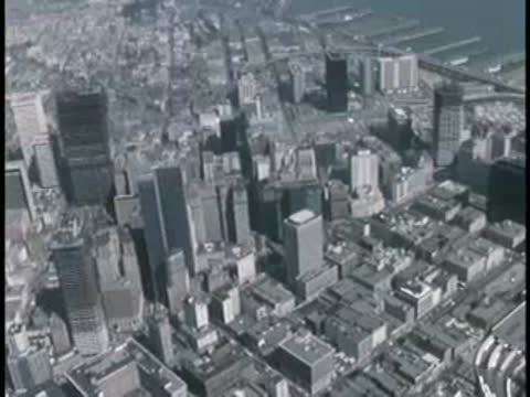 High aerial view of a dense urban cityscape with skyscrapers.