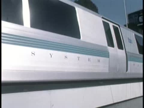 Exterior side view of the rapid transit train in motion.