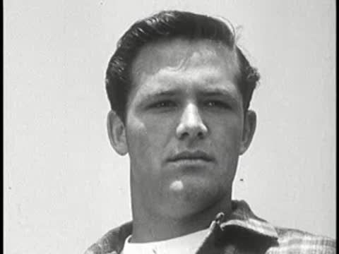 Close-up of a young man looking thoughtfully.
