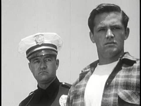 Medium shot of a police officer and a young man.