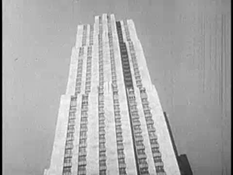 A very tall skyscraper building pointing towards the sky.