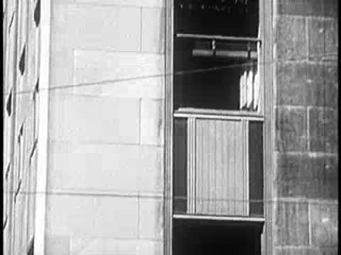 Facade of a modern multi-story office building with large windows