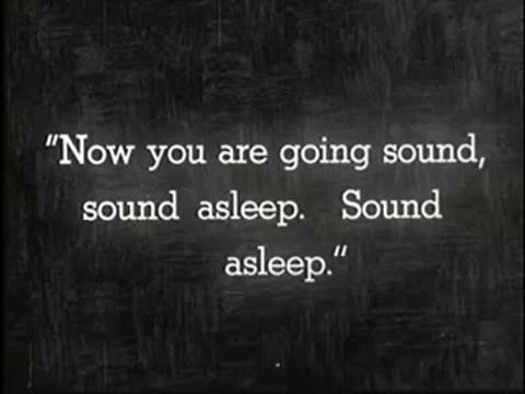 Intertitle reinforcing deep sleep suggestion, static black and white.
