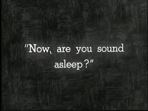 Intertitle asking "Now, are you sound asleep?", static black and white.