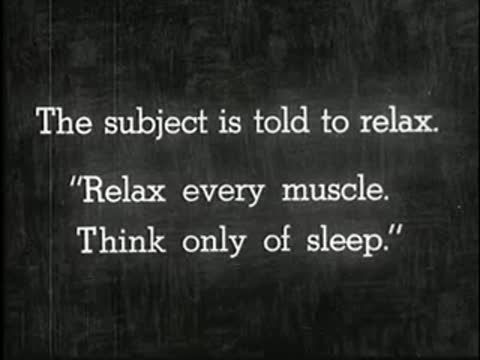Intertitle with instructions for the subject to relax and think of sleep, static black and white.