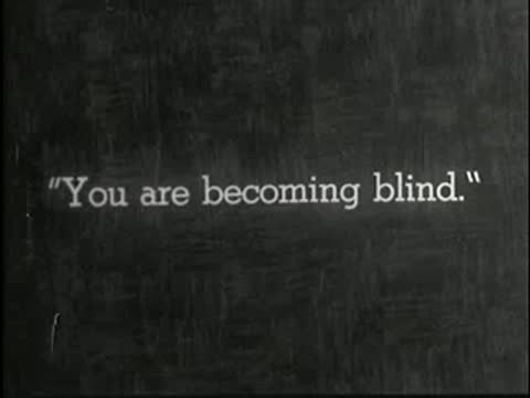 Intertitle reads "You are becoming blind." on a textured dark background.