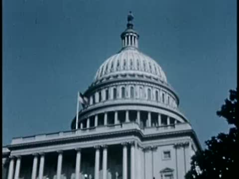 Close-up view of the US Capitol dome and columns, 1940s film style