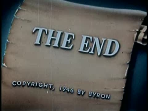 The End title card on rolled parchment with copyright 1946 by Byron text.