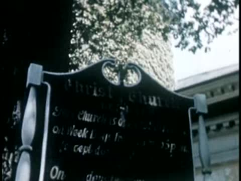 Sign reading "Christ Church" attached to post