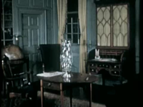 Interior room with table, chair, and globe