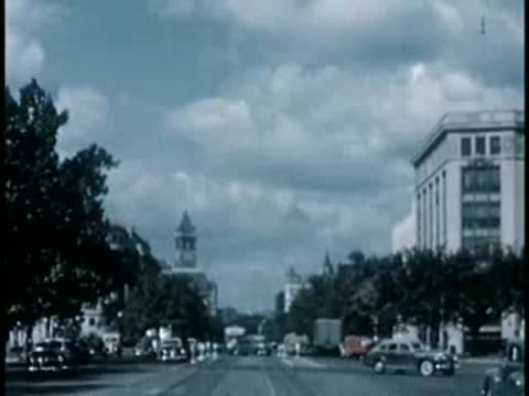Street view with cars and buildings in Washington D.C., 1946