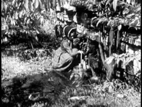 Child working outdoors near farm equipment in a rural setting.
