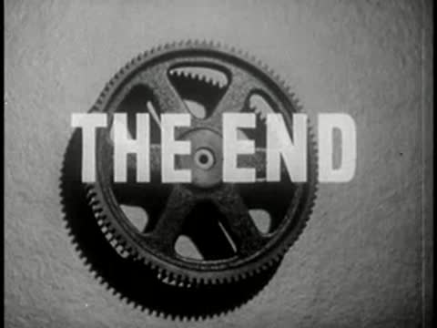 animated title screen with a large gear graphic and text saying The End