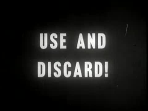 Intertitle card with the words "USE AND DISCARD!".