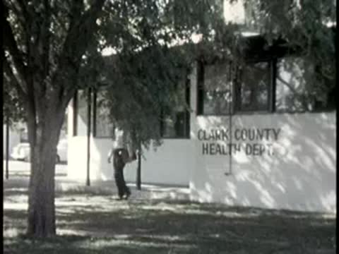 exterior view of Clark County Health Dept building with tree in foreground