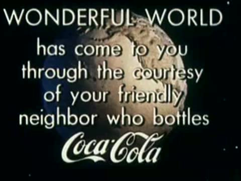 A spinning globe against a dark background with promotional text for Coca-Cola.