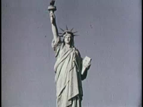 Statue of Liberty viewed from below, zooming in on the face.